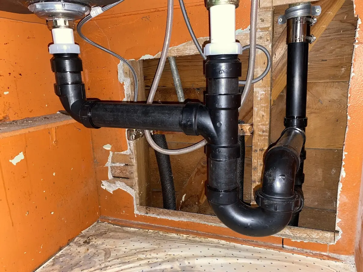 Professional Garbage Disposal Repair equipment and tools on the job in Henryetta